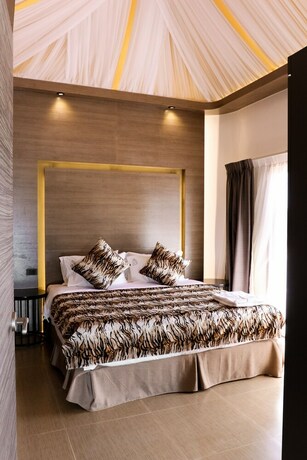 Imagen de la habitación del Hotel Safari Hotel And Villas. Foto 6