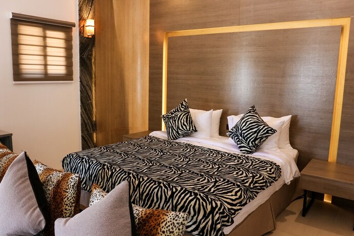 Imagen de la habitación del Hotel Safari Hotel And Villas. Foto 10