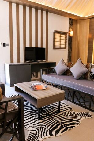 Imagen de la habitación del Hotel Safari Hotel And Villas. Foto 11