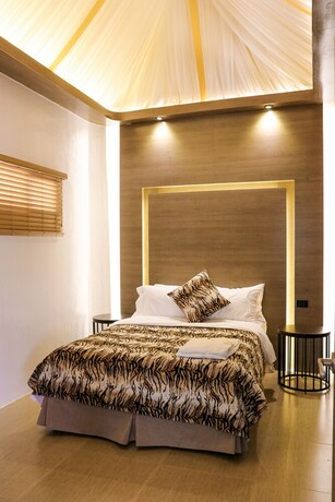 Imagen de la habitación del Hotel Safari Hotel And Villas. Foto 14