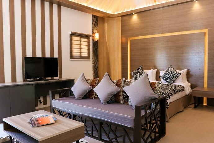 Imagen de la habitación del Hotel Safari Hotel And Villas. Foto 16