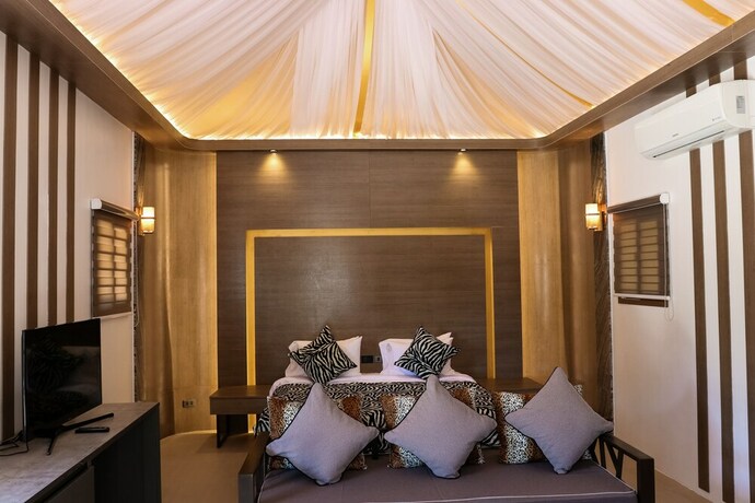 Imagen de la habitación del Hotel Safari Hotel And Villas. Foto 24