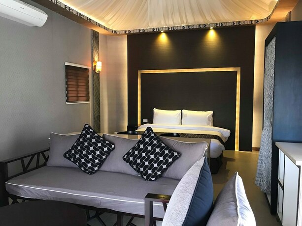 Imagen de la habitación del Hotel Safari Hotel And Villas. Foto 30