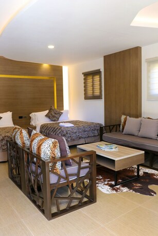 Imagen de la habitación del Hotel Safari Hotel And Villas. Foto 31