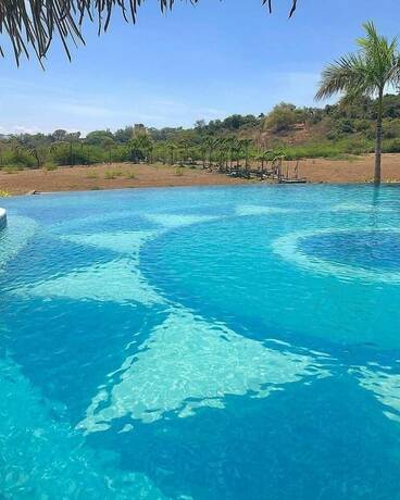 Imagen de la piscina del Hotel Safari Hotel And Villas. Foto 39