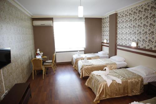 Imagen de la habitación del Hotel Safir Gold Palace. Foto 14