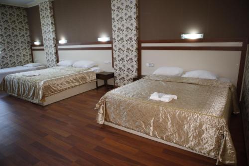 Imagen de la habitación del Hotel Safir Gold Palace. Foto 16