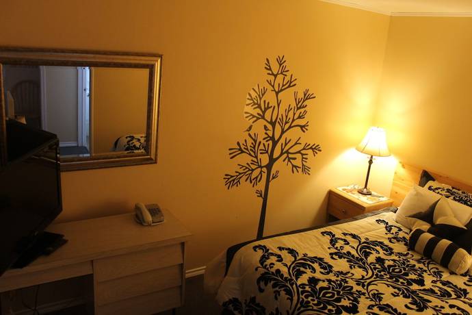Imagen de la habitación del Hotel Sage Hills Motel. Foto 5