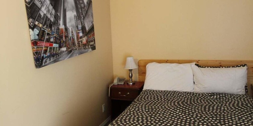 Imagen de la habitación del Hotel Sage Hills Motel. Foto 19