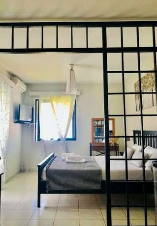 Imagen de la habitación del Hotel Sagini. Foto 25