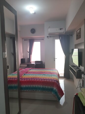 Imagen de la habitación del Hotel Sagita Residence-Taamansari Mahogany. Foto 11