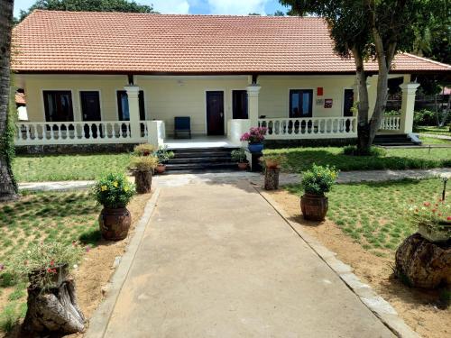 Imagen de la habitación del Hotel S&agrave;i G&ograve;n C&ocirc;n Đảo Resort. Foto 19