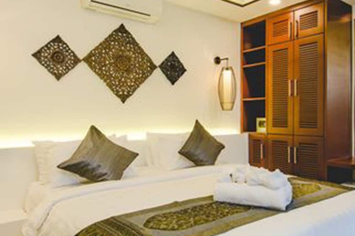 Imagen de la habitación del Hotel Sahaa Beach Resort. Foto 12