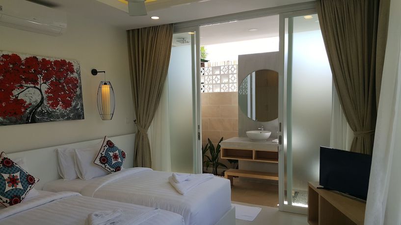 Imagen de la habitación del Hotel Sahaa Beach Resort. Foto 13