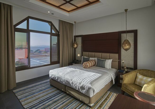 Imagen de la habitación del Hotel Sahab Resort and Spa. Foto 18