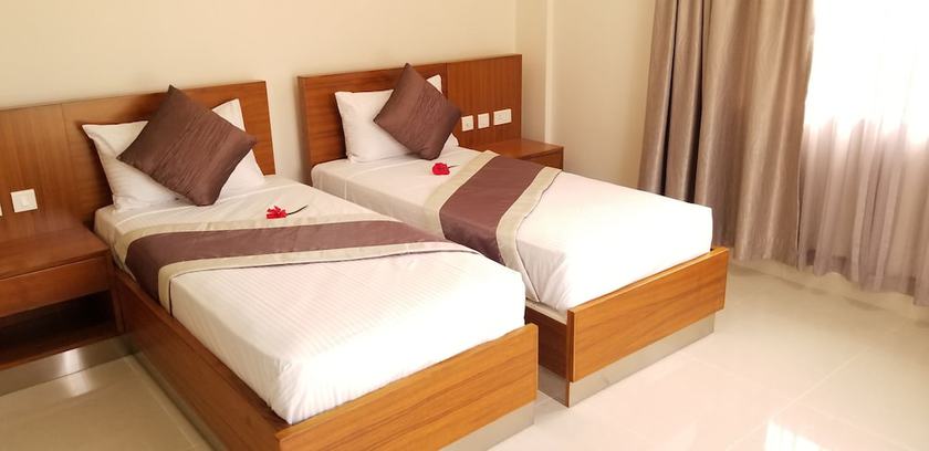 Imagen de la habitación del Hotel Sahaj Holiday Apartments. Foto 11