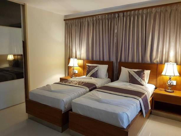 Imagen de la habitación del Hotel Sahaj Holiday Apartments. Foto 12