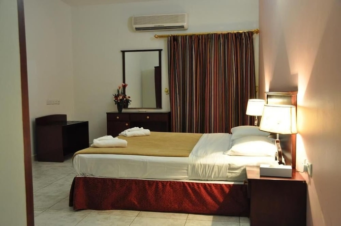 Imagen de la habitación del Hotel Sahara Apartment. Foto 8