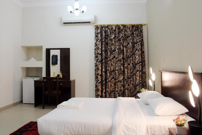 Imagen de la habitación del Hotel Sahara Apartment. Foto 11