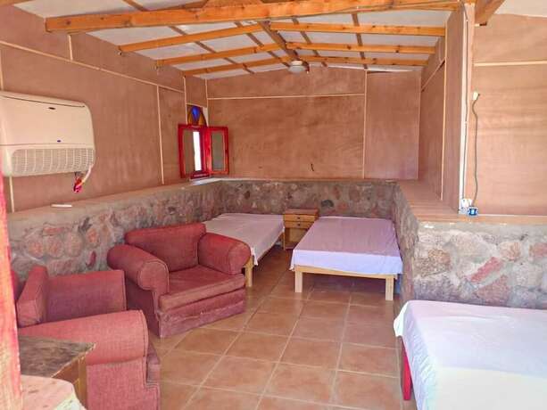 Imagen de la habitación del Hotel Sahara Beach Camp. Foto 20