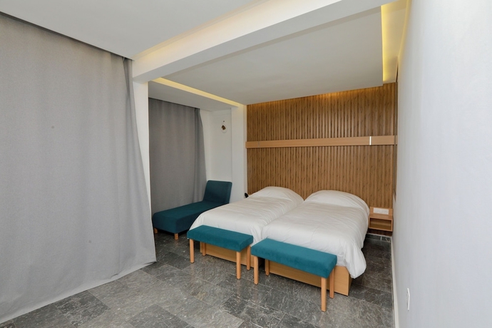 Imagen de la habitación del Hotel Sahara Beach. Foto 8