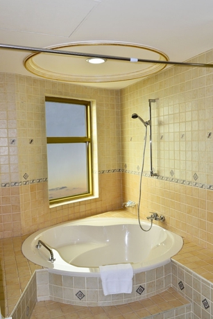 Imagen de la habitación del Hotel Sahara Beach Resort and Spa. Foto 7