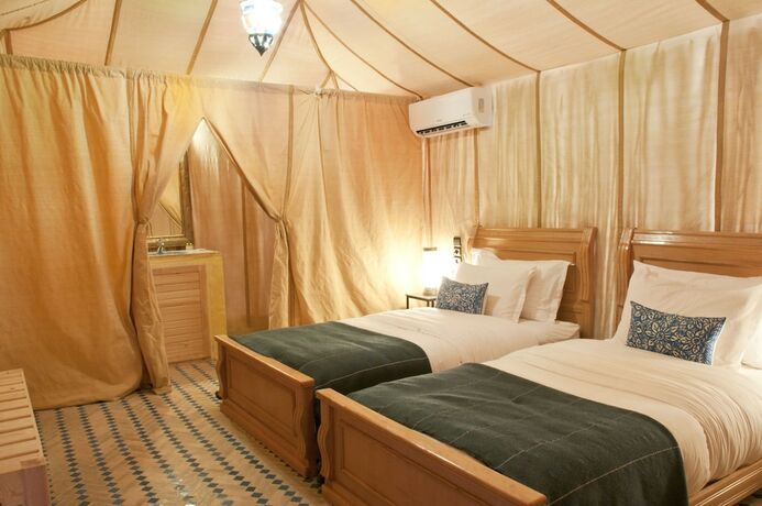 Imagen de la habitación del Hotel Sahara Luxury Camps. Foto 12