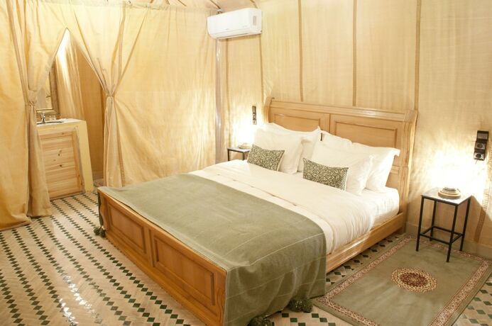 Imagen de la habitación del Hotel Sahara Luxury Camps. Foto 13