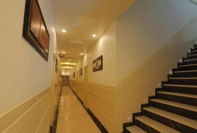 Imagen de la habitación del Hotel Sahibs Red Carpet. Foto 10