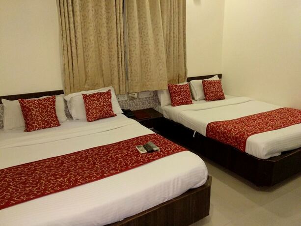 Imagen de la habitación del Hotel Sai Grand Castle Inn. Foto 11