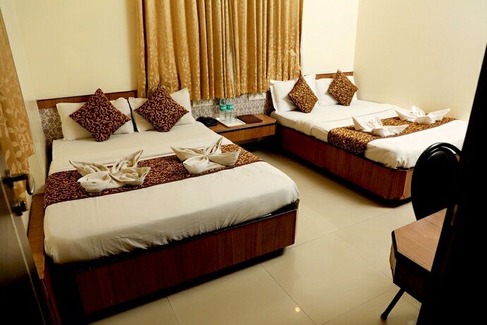 Imagen de la habitación del Hotel Sai Grand Castle Inn. Foto 12