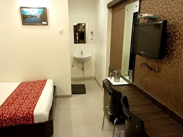 Imagen de la habitación del Hotel Sai Grand Castle Inn. Foto 13