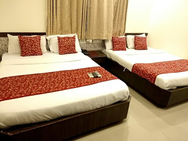 Imagen de la habitación del Hotel Sai Grand Castle Inn. Foto 14