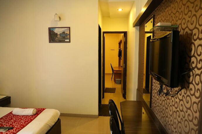 Imagen de la habitación del Hotel Sai Grand Castle Inn. Foto 20