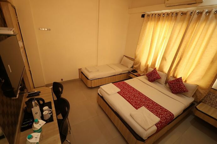 Imagen de la habitación del Hotel Sai Grand Castle Inn. Foto 21