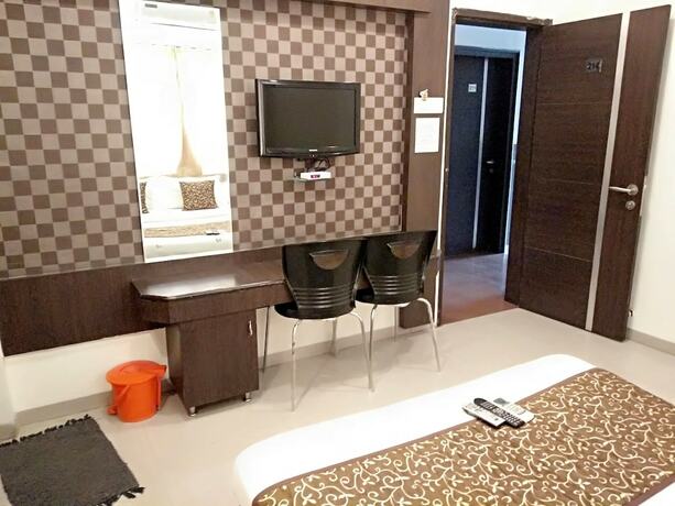 Imagen de la habitación del Hotel Sai Grand Castle Inn. Foto 22