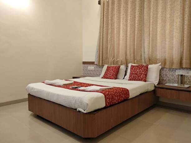 Imagen de la habitación del Hotel Sai Grand Castle Inn. Foto 26