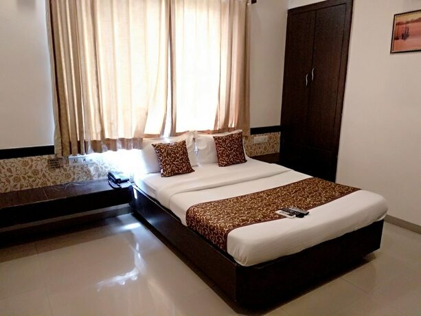 Imagen de la habitación del Hotel Sai Grand Castle Inn. Foto 28