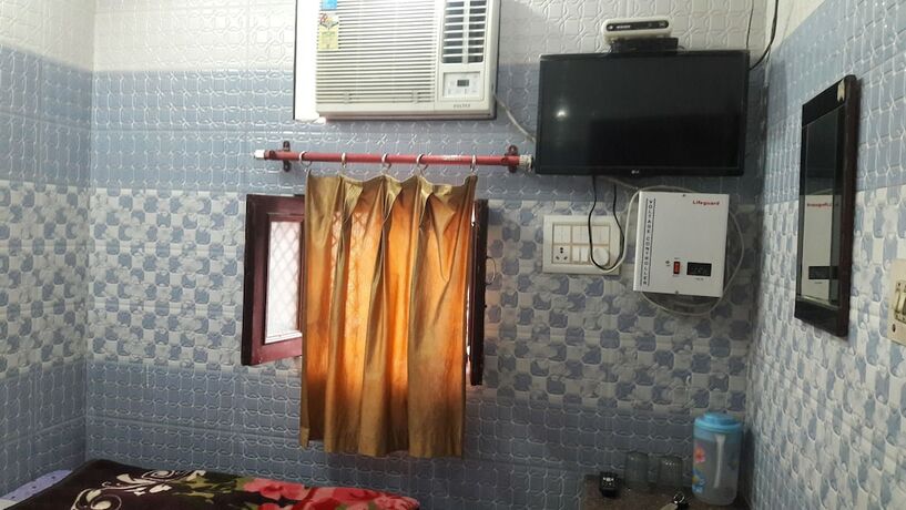 Imagen de la habitación del Hotel Sai Kripa Guest House. Foto 15