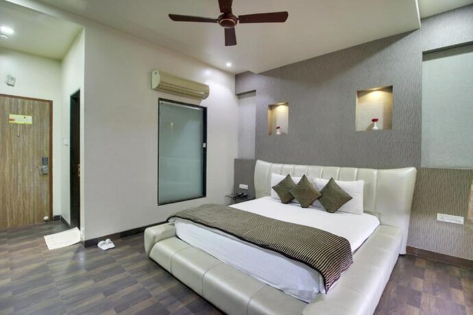 Imagen de la habitación del Hotel Sai Miracle. Foto 23