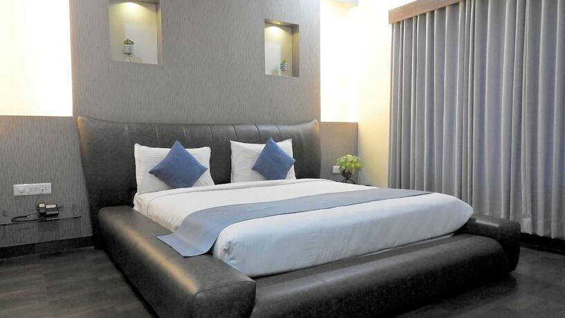 Imagen de la habitación del Hotel Sai Miracle. Foto 26