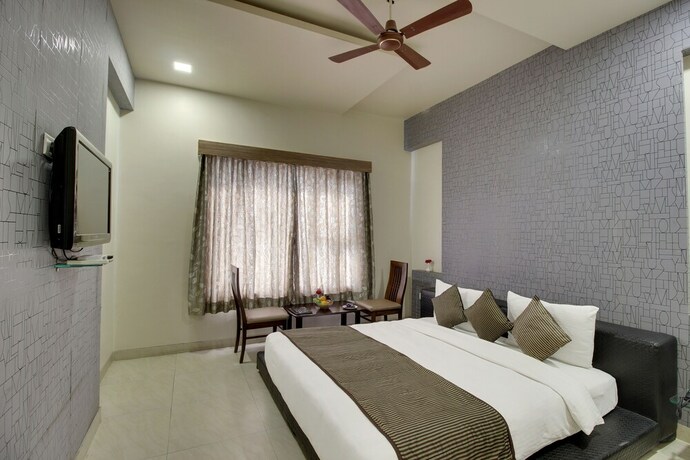 Imagen de la habitación del Hotel Sai Miracle. Foto 28