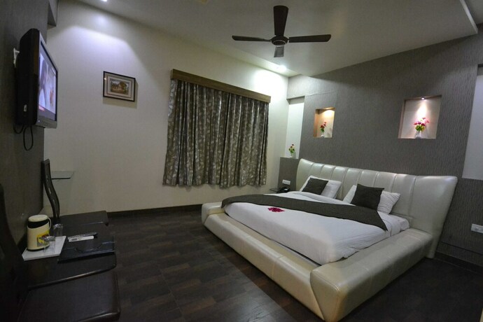 Imagen de la habitación del Hotel Sai Miracle. Foto 30