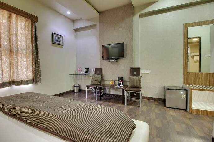 Imagen de la habitación del Hotel Sai Miracle. Foto 31