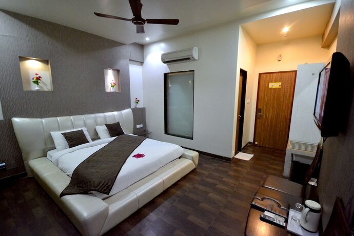 Imagen de la habitación del Hotel Sai Miracle. Foto 32