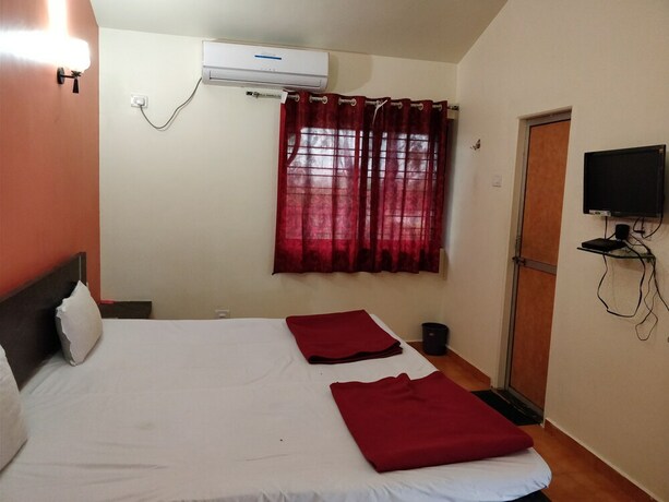 Imagen de la habitación del Hotel Sai Plaza. Foto 24