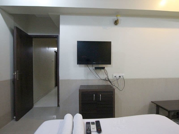 Imagen de la habitación del Hotel Sai Sharan Stay Inn. Foto 8