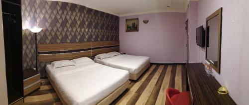 Imagen de la habitación del Hotel Sai Villa Near Klia & Klia2. Foto 3