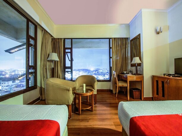 Imagen de la habitación del Hotel Sai Vishram Business. Foto 21