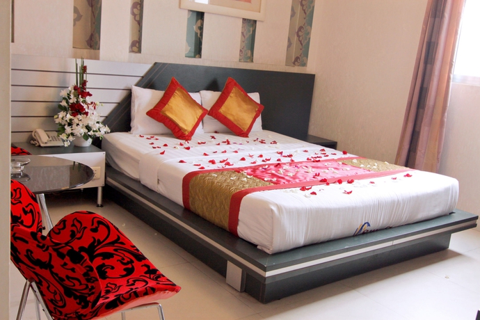 Imagen de la habitación del Hotel Saigon Charm. Foto 8